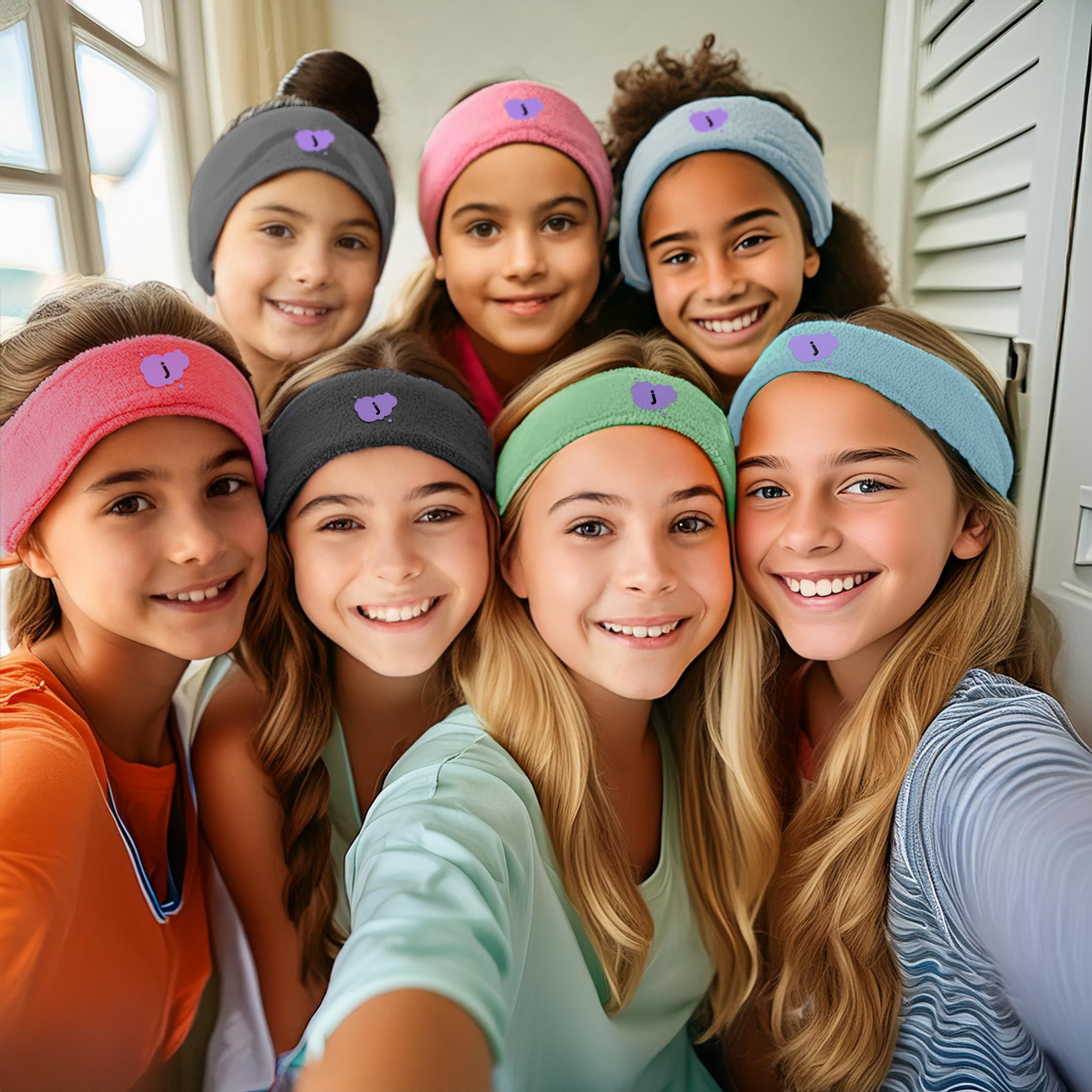 group of young girls wearing jellee bands taking a selfie