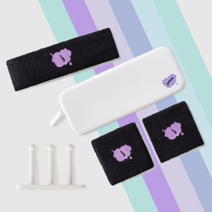 black jellee headband and two terry wristbands a custom mirror hook and a silicone travel bag on a colorful striped background